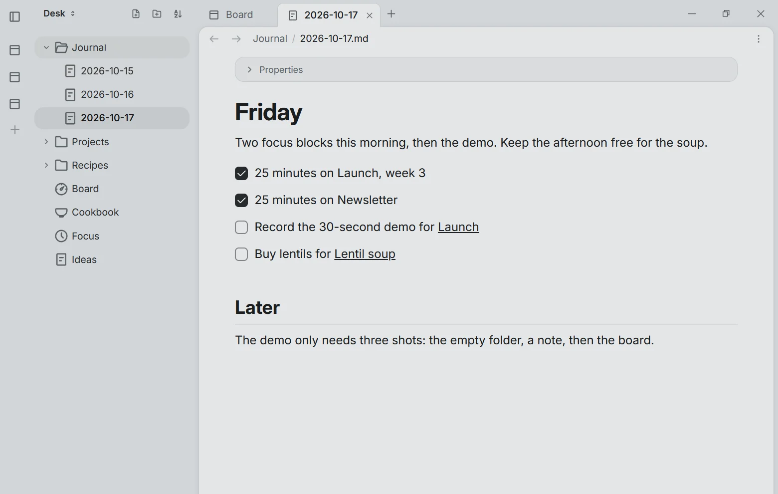 A Slate window: the folder Desk in the sidebar with Journal, Projects, Recipes, three apps and a note; tabs for Board and today's journal note, which is open: Friday, two finished focus blocks and two tasks.